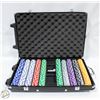 Image 1 : HEAVY POKER CHIP SET. CASE HAS HANDLE AND ROLLERS.