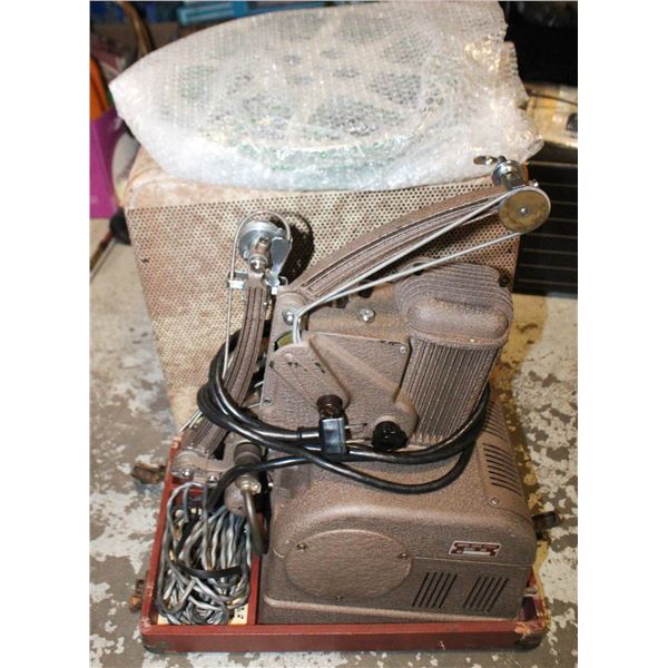 AMPRO 16MM MOVIE PROJECTOR WITH REELS
