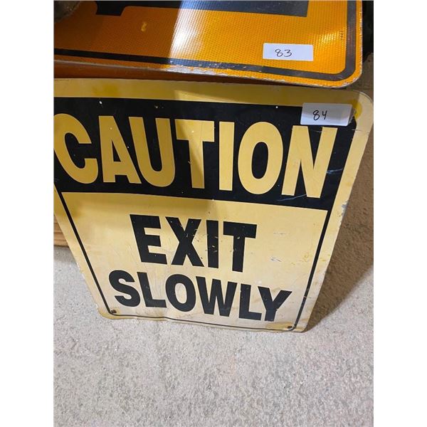 CATION EXIT SLOWLY SIGN
