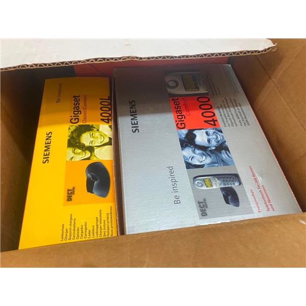 BOX OF WHAT LOOKS LIKE CORDLESS LAND-LINE PHONES