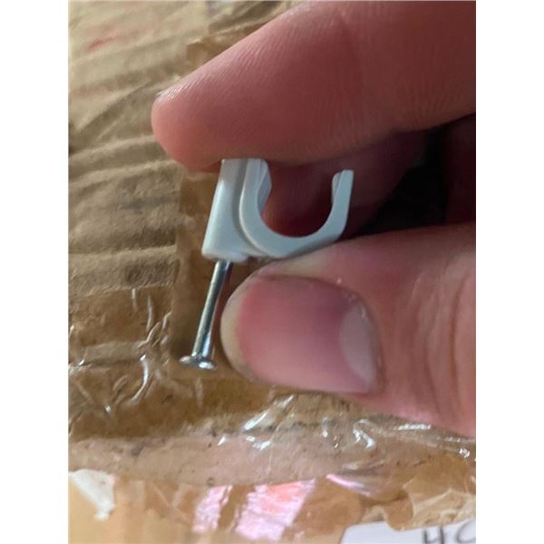 BOX LOT FULL OF SMALL CABLE HOLDERS