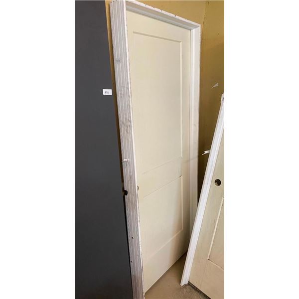 32IN INTERIOR DOOR - HAS SMALL DING AND WOULD BE COVERED BY PAINT