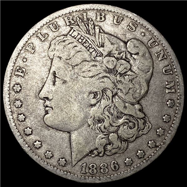 1886-O Silver Morgan Dollar ABOUT  UNCIRCULATED