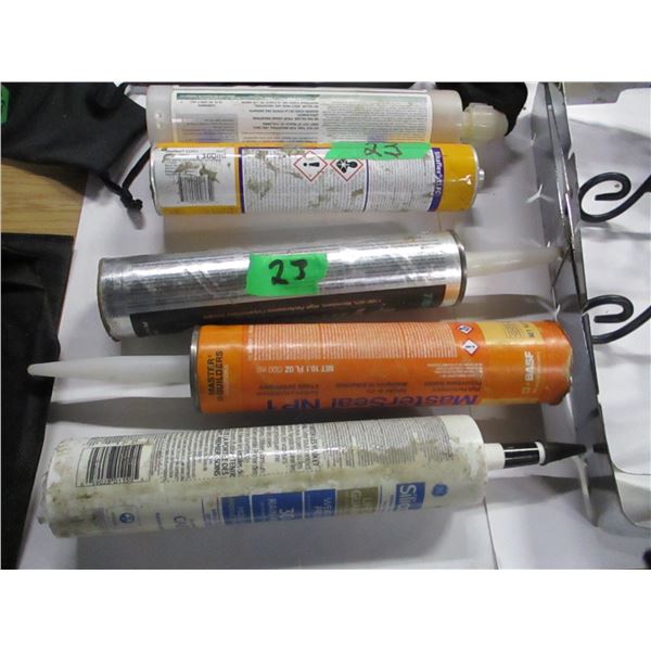 FLAT C/W ASSORTED CAULKING, FACE MASKS, PLATE STANDS, ETC