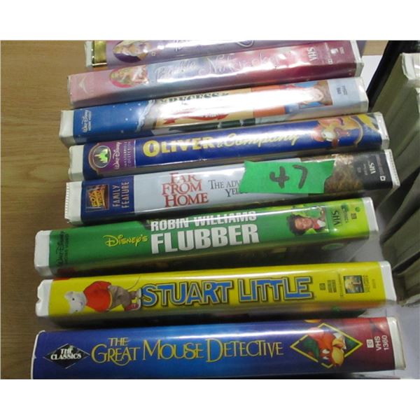 ESTATE:  FLAT C/W APPROX. 14 VHS MOVIES (MOSTLY DISNEY) INCLUDING FLUBBER, POCAHONTAS II, ETC