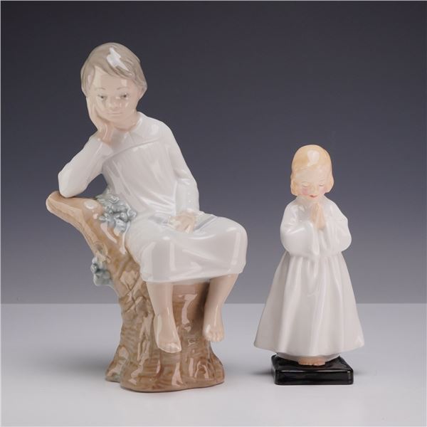 Two Porcelain Figurines Including Lladro Little Boy Thinking and Royal Doulton Bedtime