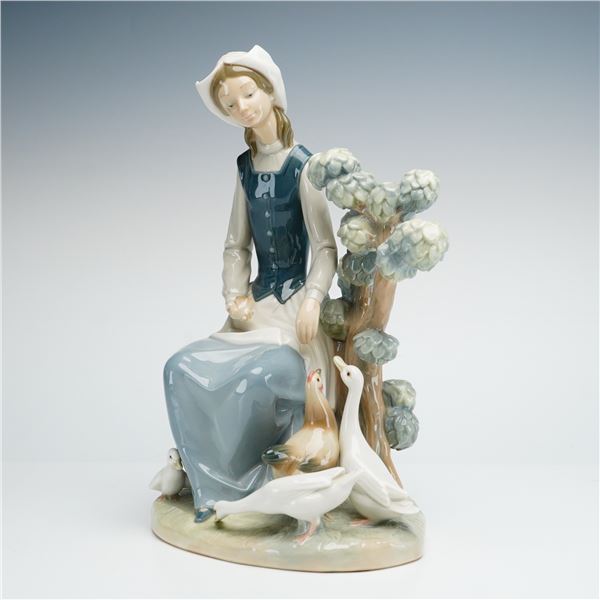 Lladro Glazed Porcelain Figurine Seated Young Woman with Geese