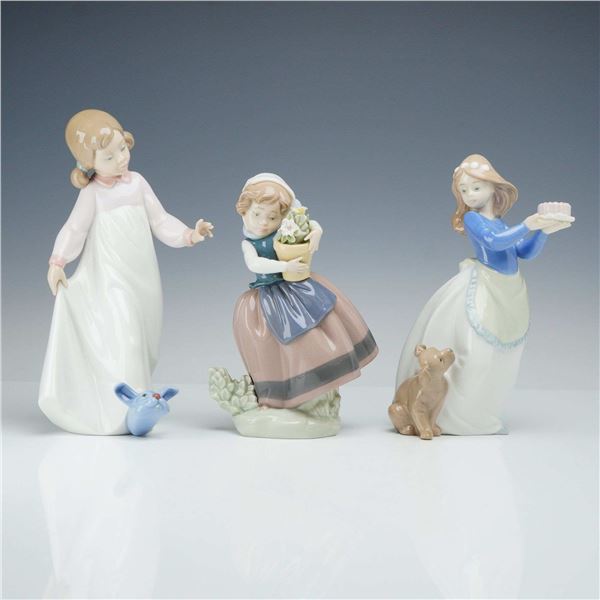 Three Lladro and Nao Glazed Porcelain Figurines, Spring is Here 01005223 & Off to Bed 01006421
