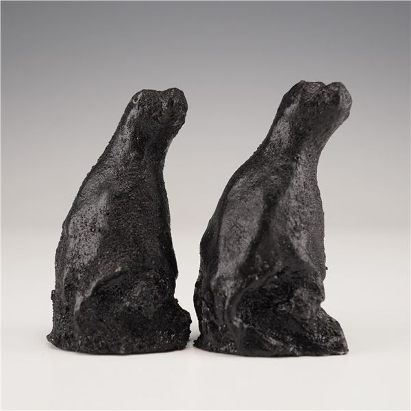 Pair of Hand-Carved Lava Rock Abstracted Seals