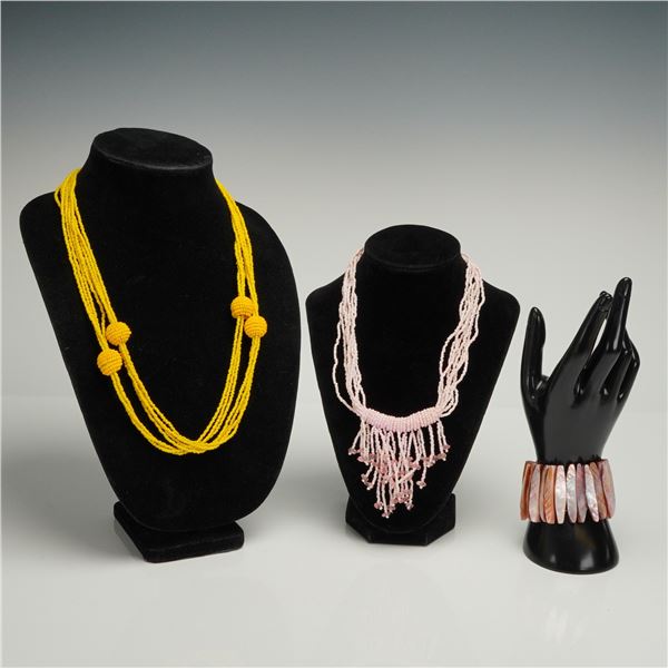 A Trio of Contemporary Beaded Necklaces and Shell Cuff Bracelet Set