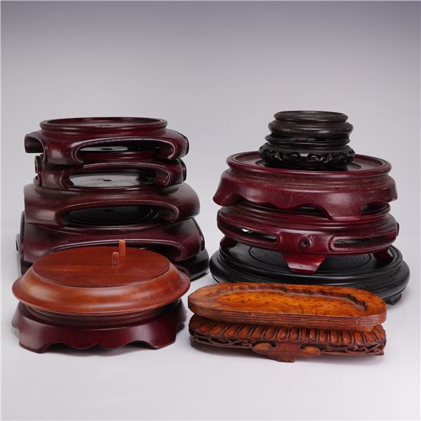 A Collection of 13 Chinese Carved Wooden Display Bases