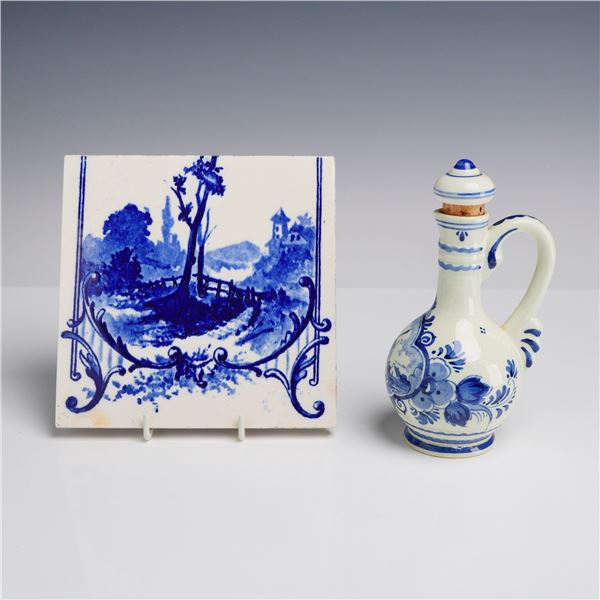 2pc Blue and White Ceramic Items Including a Decorative Landscape Tile and a Delft Oil Cruet