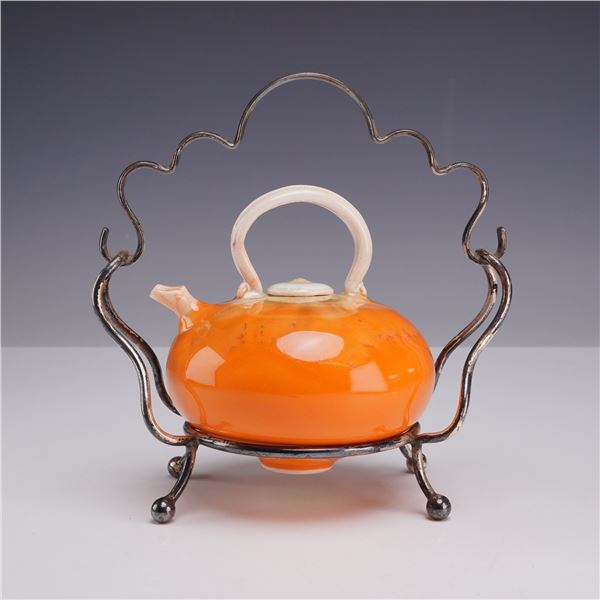 Fong Choo Orange Glazed Ceramic Teapot on Silver-Plated Stand