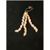 Image 5 : Niihau Triple Strand Onikiniki Momi Shell Earrings w/ Puka Shell 3.5"L