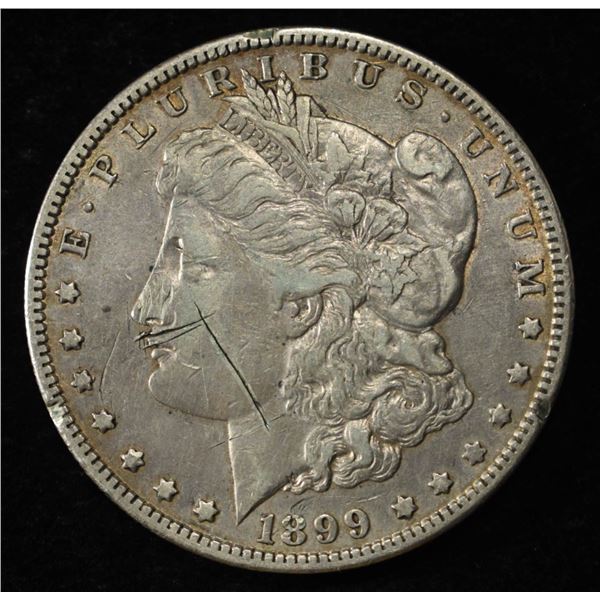 1899-O MORGAN DOLLAR DAMAGED