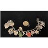 Image 1 : SILVER CHARM BRACELET WITH MULTIPLE SILVER AND METAL CHARMS & 1967 CANADA SILVER QUARTER PENDANT ...