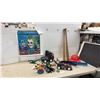 Image 1 : Joker Painting, Little Tikes Toy Vehicles, Wooden Baseball Bats, Plastic Fireman Hat, and More