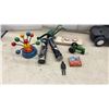 Image 4 : Joker Painting, Little Tikes Toy Vehicles, Wooden Baseball Bats, Plastic Fireman Hat, and More