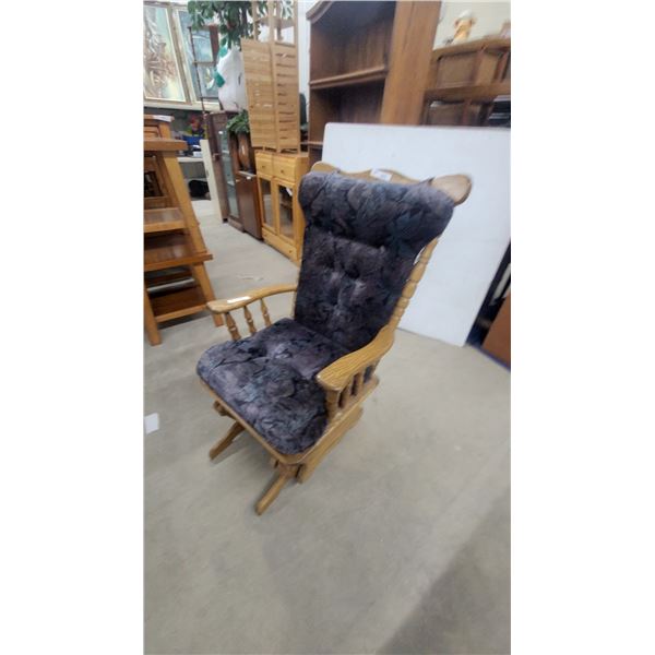 Oak Glider Rocker with Dark Patterned Upholstered Cushions