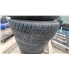 Image 4 : Set of Four General Evertrek 205/60R15 Tires on Ford 15" Eight-Spoke Silver Alloy Wheels