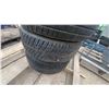 Image 5 : Set of Four General Evertrek 205/60R15 Tires on Ford 15" Eight-Spoke Silver Alloy Wheels