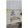 Image 1 : Black Wrought Iron Wall Candle Sconce, Towel Rack, and White Scrollwork Decor