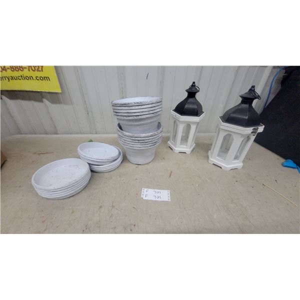 White and Black Hexagonal Decorative Lanterns, White Plastic Planters, and Saucers