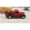 Image 6 : Vintage Sun Rubber Co. Plastic Pig Banks, Case IH Truck Bank with Key, Globe Bank, and More