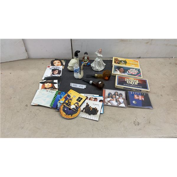 Assorted Avon Pipe-Shaped Cologne Bottles, Porcelain Figurines, Music CDs, and More
