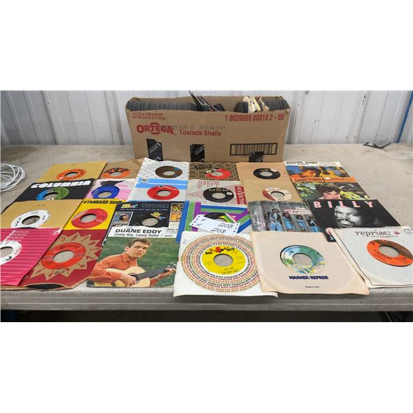 Collection of 7-Inch 45 RPM Vinyl Records with Original Sleeves and More