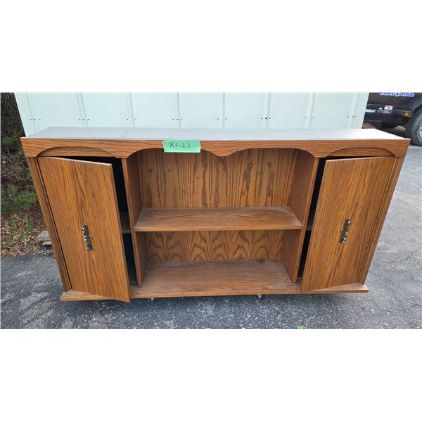 Two Shelf Two Door Book Shelf, 62" x 32" x 10", 12 Small Engine and Auto Repair Manuals.