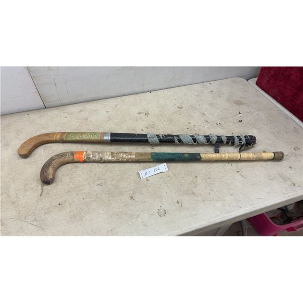 Two Vintage Wooden Field Hockey Sticks with Olympic Team Signatures