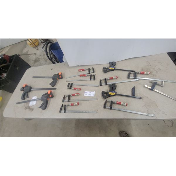 Assorted Woodworking Clamps Including Bar Clamps, F-Clamps, and Quick-Grip Clamps 14x