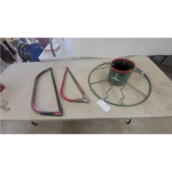 Two Red Bow Saws and Green Metal Christmas Tree Stand with Adjustable Thumbscrews