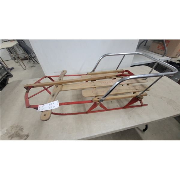 Thistle Vintage Steering Sled with Red Metal Frame, Wood Deck, and Chrome Steering Bar
