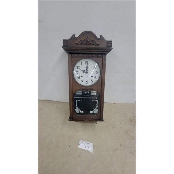 Citizen 31-Day Mechanical Wall Clock with Day-Date Calendar and Carved Wooden Case
