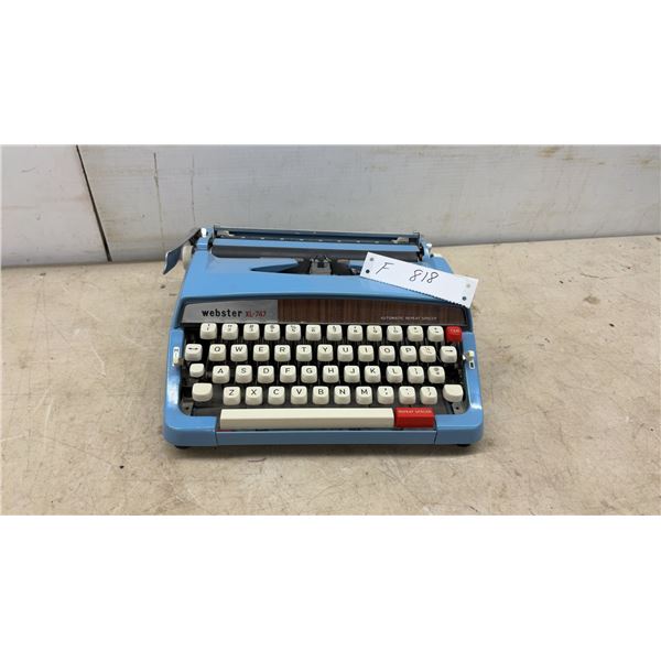 Webster XL-747 Portable Manual Typewriter in Light Blue with Automatic Repeat Spacer