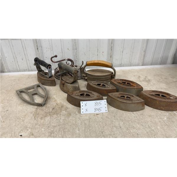 Collection of Antique Cast Iron Sad Irons, Taylor Forbes Bases, and Family Laundry Iron