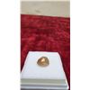 Image 6 : 8.0 Carat Natural Untreated Imperial Topaz, Oval Cut, 10.3 x 11.7 Millimeters