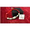 Image 1 : Natural Burmese Multi-Color Jadeite 53.00 Carat 11-Piece Adjustable Red Cord Bracelet, 2-3"