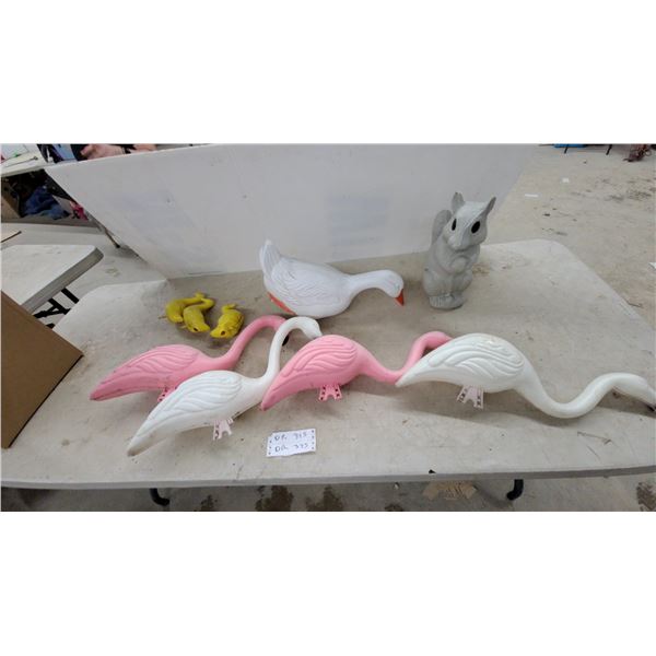 Plastic Lawn Ornaments: Pink Flamingos, White Goose, Ducklings, and Gray Squirrel