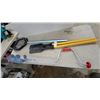 Image 1 : Manual Ice Auger Appears New with Red Handle, Kayak Paddle, and Fishing Landing Net