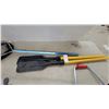 Image 4 : Manual Ice Auger Appears New with Red Handle, Kayak Paddle, and Fishing Landing Net
