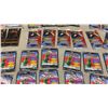 Image 7 : 50 Packs Trading Cards: Trash Pack, Dinosaurs, New Moon, Light-Up Yazzlies Badges and More