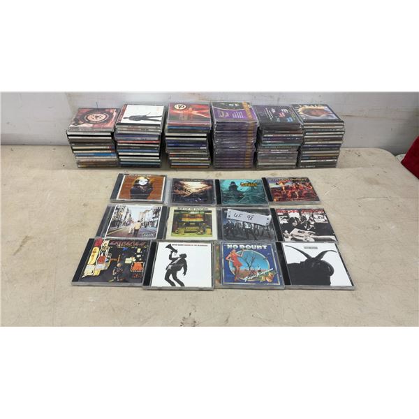 Collection of Rock and Pop Music CDs: Oasis, No Doubt, Bryan Adams, Bon Jovi, and More