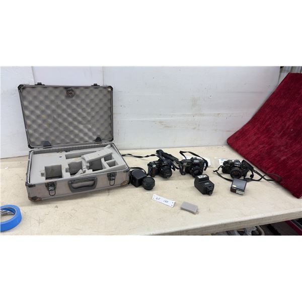Minolta Maxxum 5000 and 7000 AF SLR Cameras with 50mm f/1.7 Lens, Case, and More