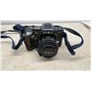 Image 5 : Minolta Maxxum 5000 and 7000 AF SLR Cameras with 50mm f/1.7 Lens, Case, and More