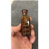 Image 2 : Two Antique Amber Glass Skull and Crossbones Embossed Liquid Iodine Poison Bottles