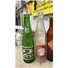 Image 2 : Collection of 17 Vintage Soda Bottles: 2 Way, Orange Crush, Coca-Cola, 7Up, Diet-Rite, and More