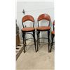 Image 2 : Set of Six Bar Stools with Orange Upholstered Seats, Black Metal Frames, and Table Base